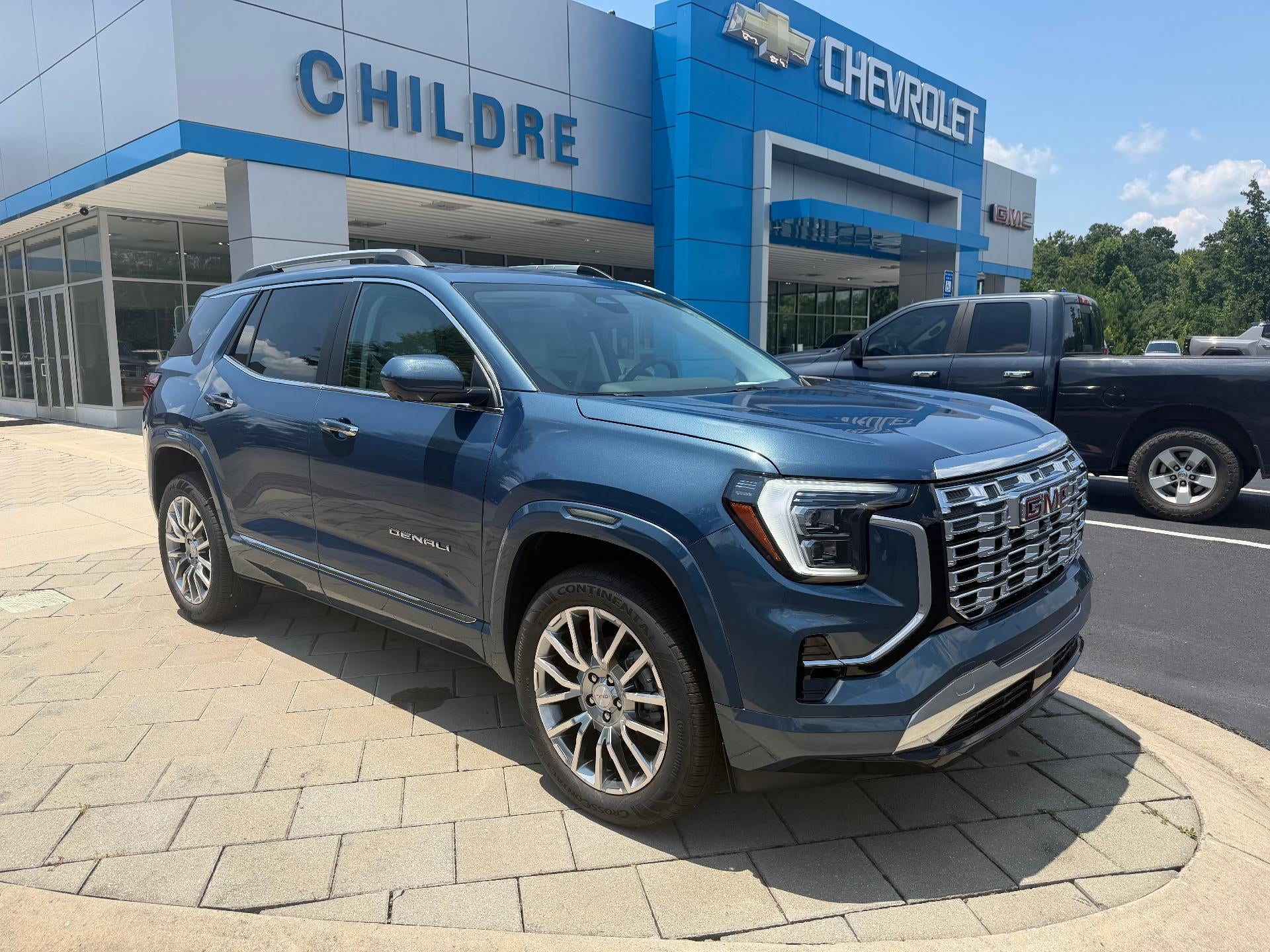 2026 GMC Terrain Denali in Downpour Metallic — front three-quarter view