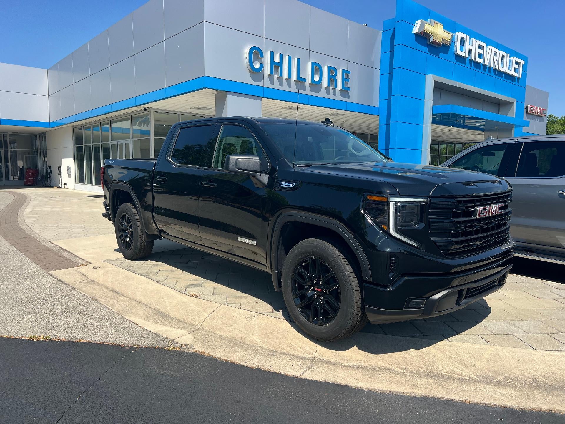 2026 GMC Sierra 1500 Elevation in Onyx Black — front three-quarter view