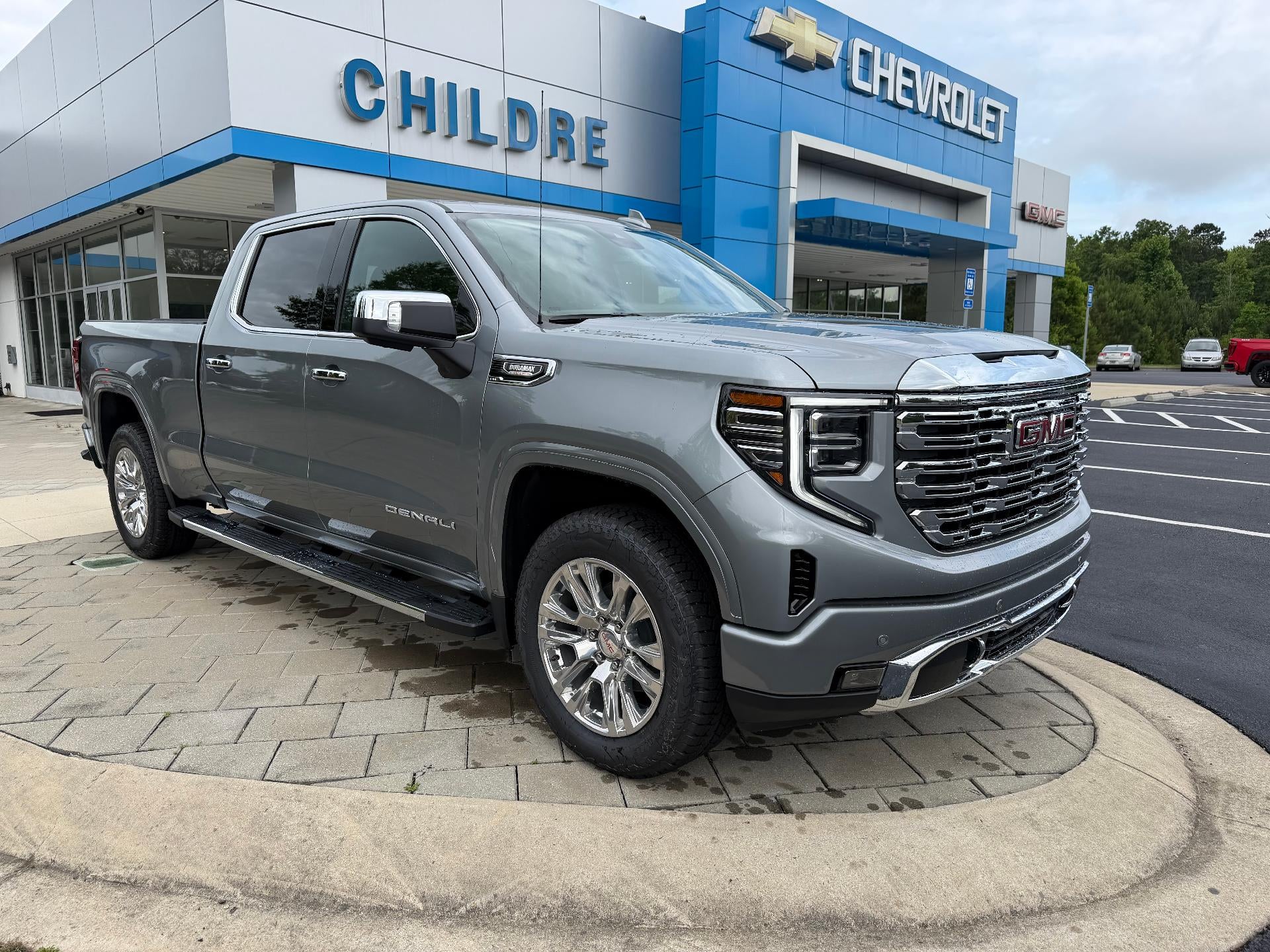 2026 GMC Sierra 1500 Denali in Sterling Metallic — front three-quarter view